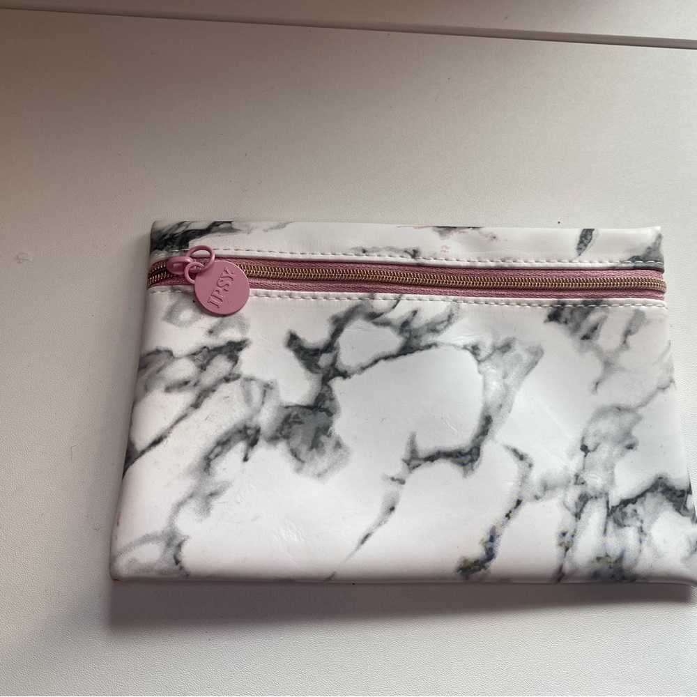Whirlpool and black makeup bag